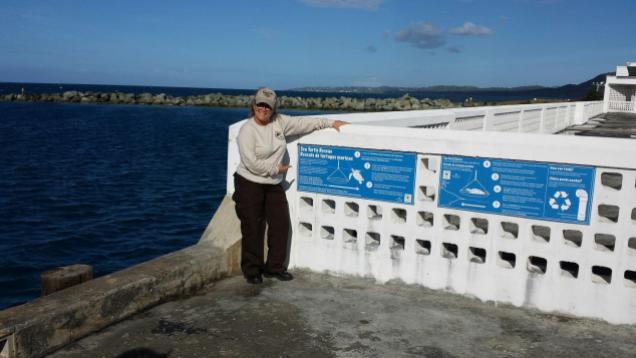 Suki with the new RPI signs on Mosquito Pier.
